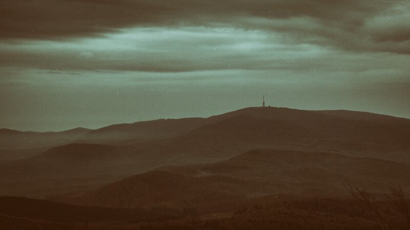 Mountain Range with Tower