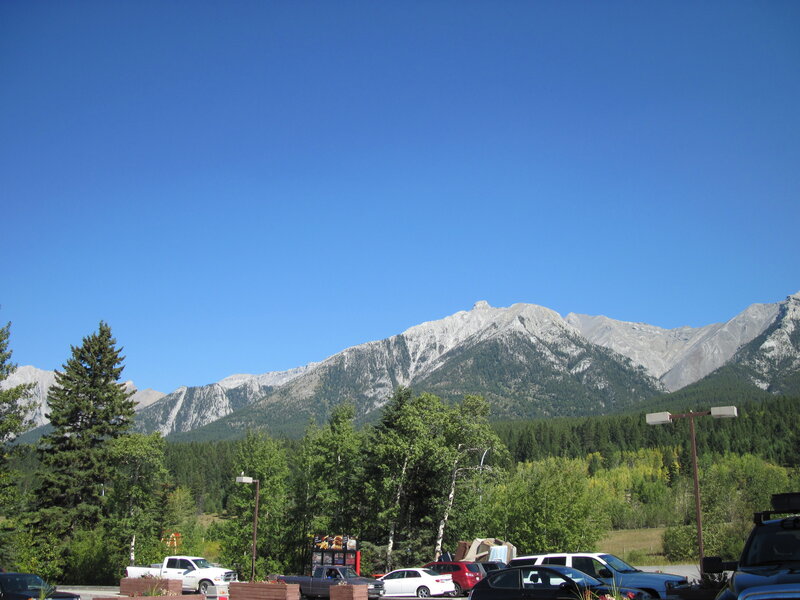 Mountain Range with Trees — Blue, Serene, Afternoon, Photograph, Cars
