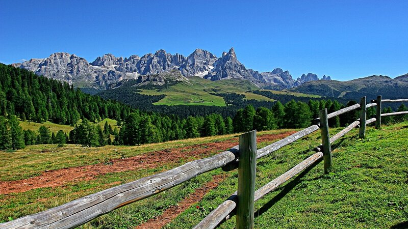 Mountain Range with Wooden Fence