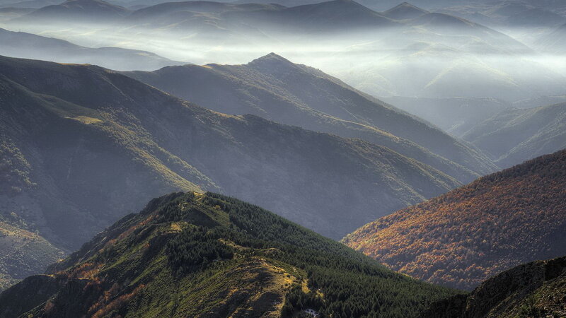 Mountain ranges in misty light