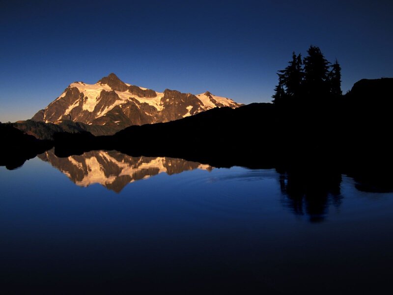 Mountain reflected in a lake at dawn