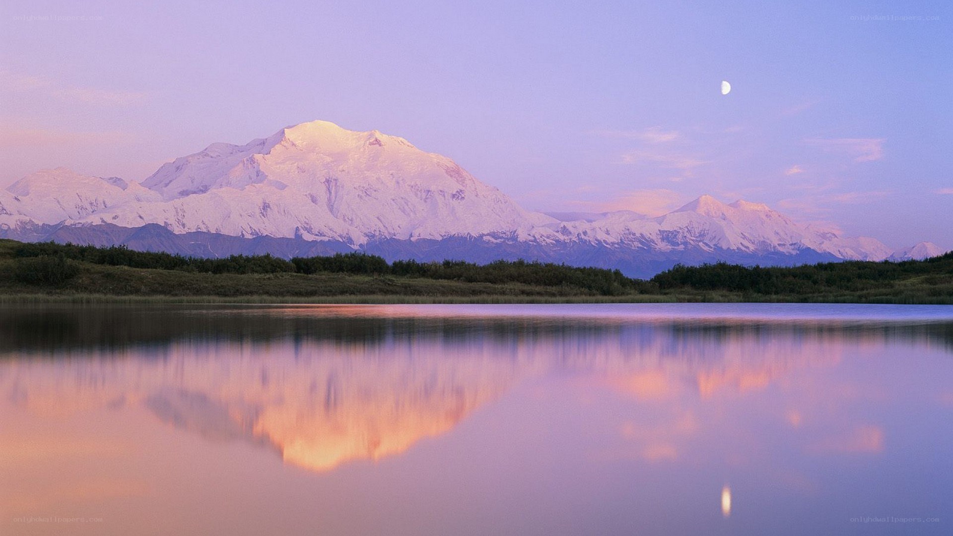 Mountain reflected in a lake at dusk