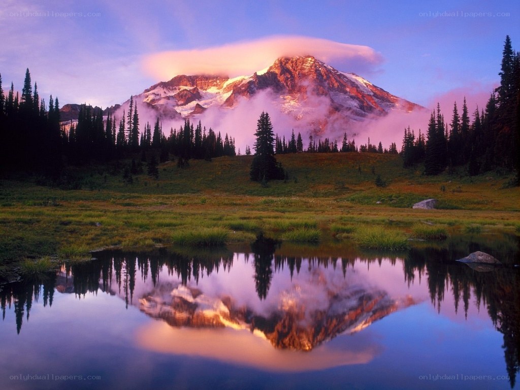 Mountain reflected in a lake at sunset