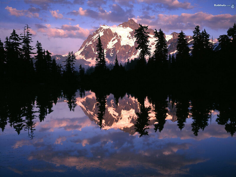 Mountain reflected in a lake at sunset