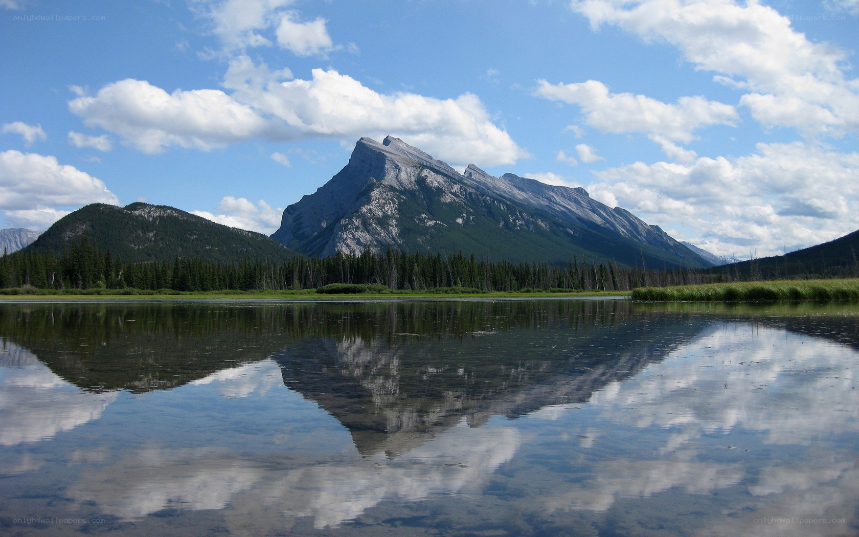 Mountain reflected in calm lake