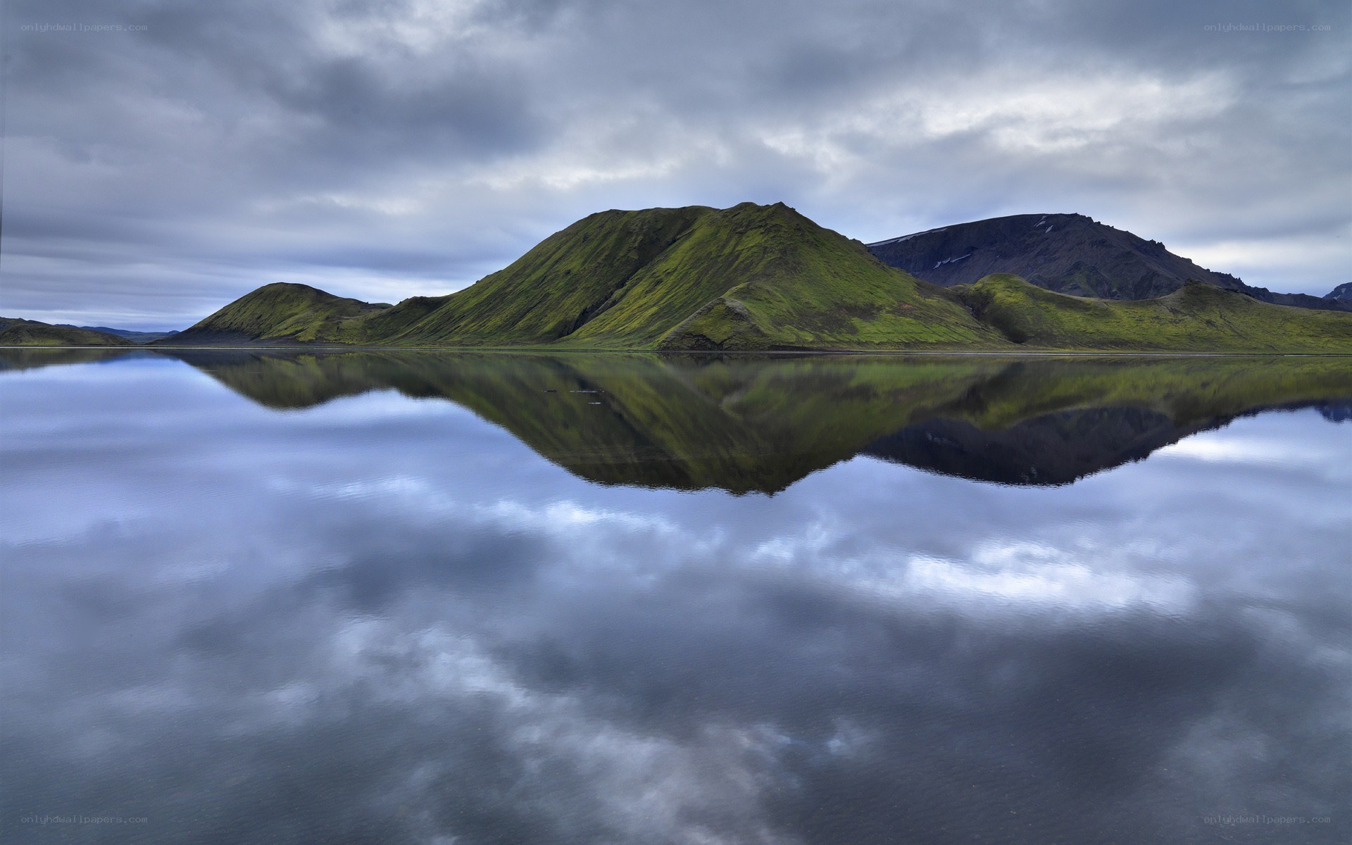 Mountain reflected in calm lake