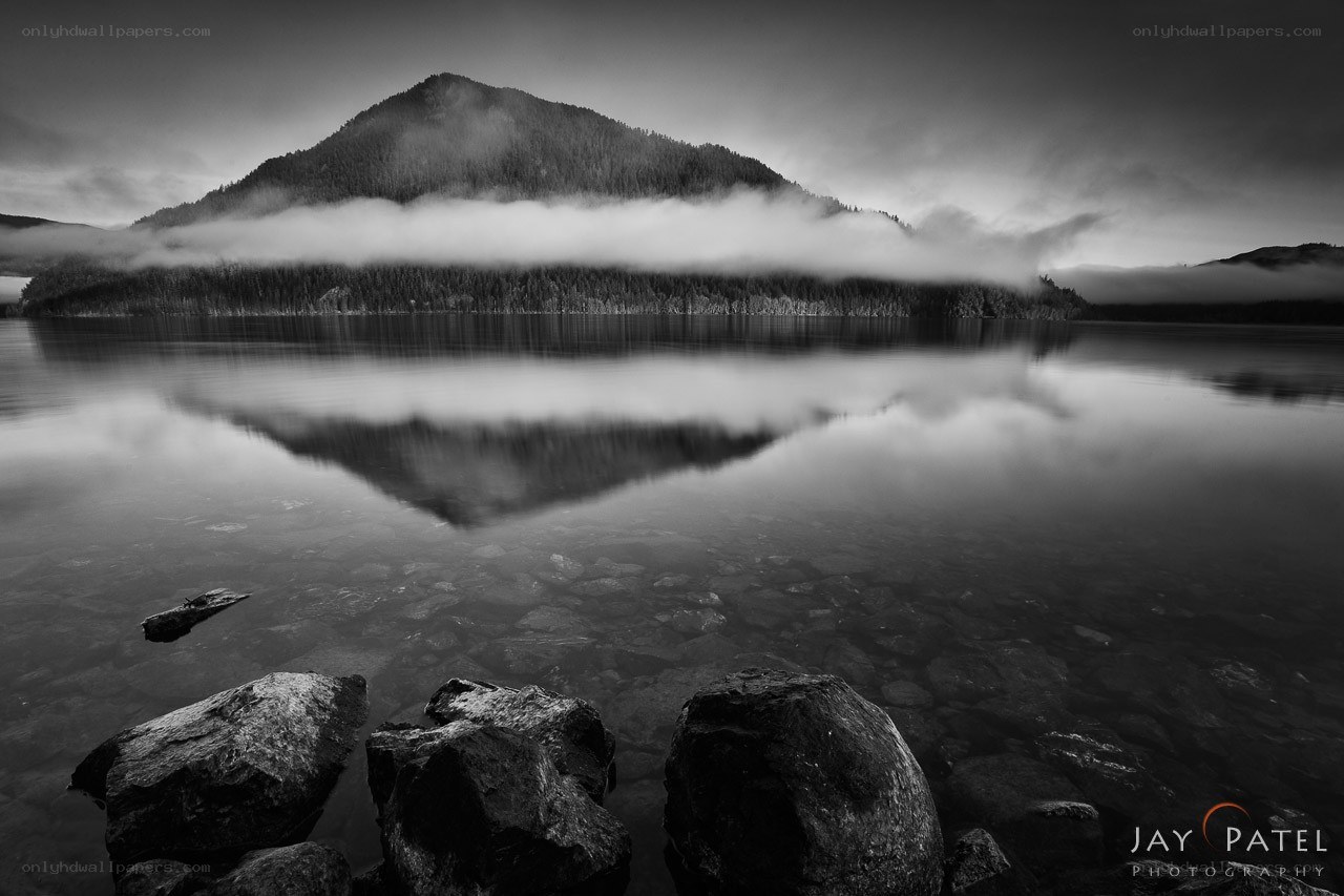 Mountain reflected in calm lake
