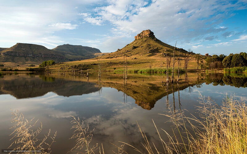Mountain reflected in calm lake