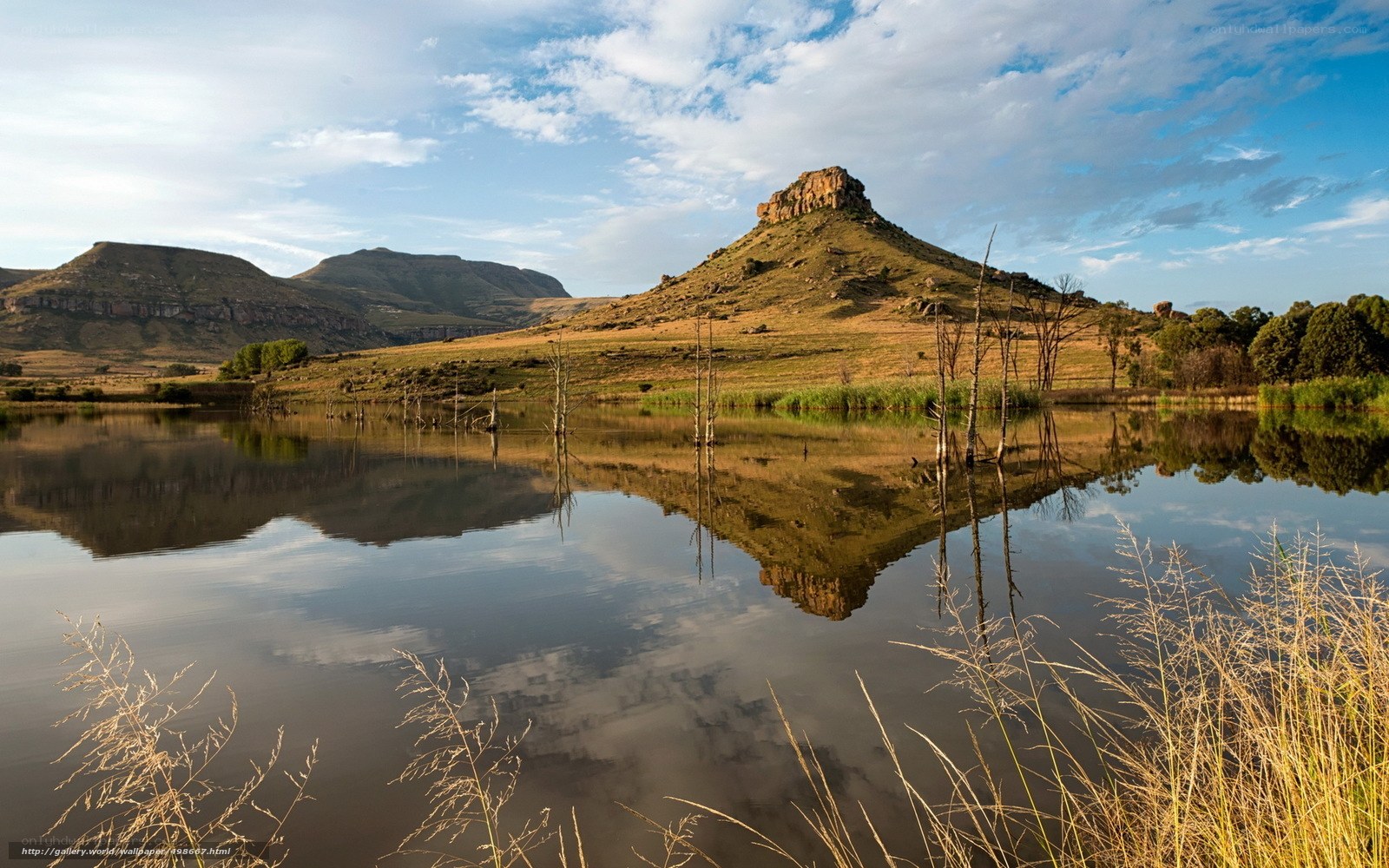 Mountain reflected in calm lake