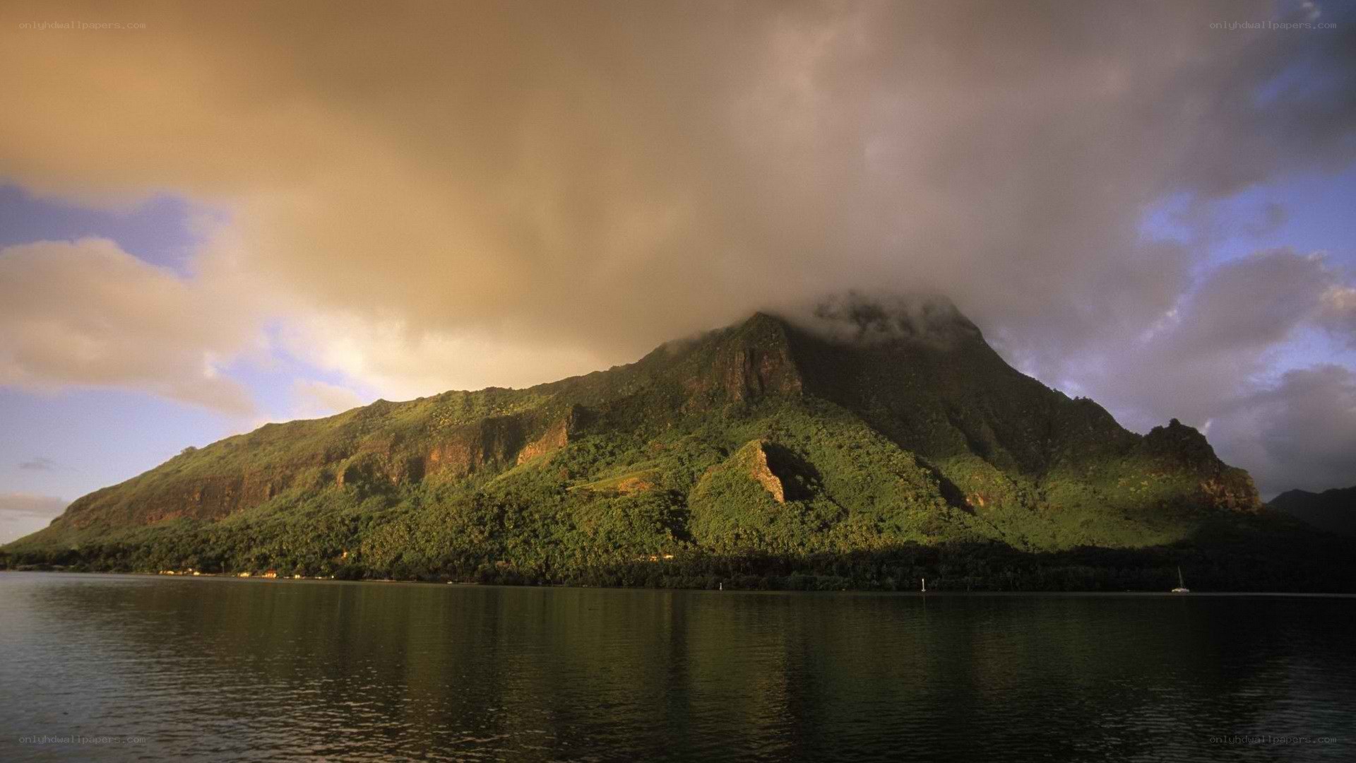 mountain reflected in calm water