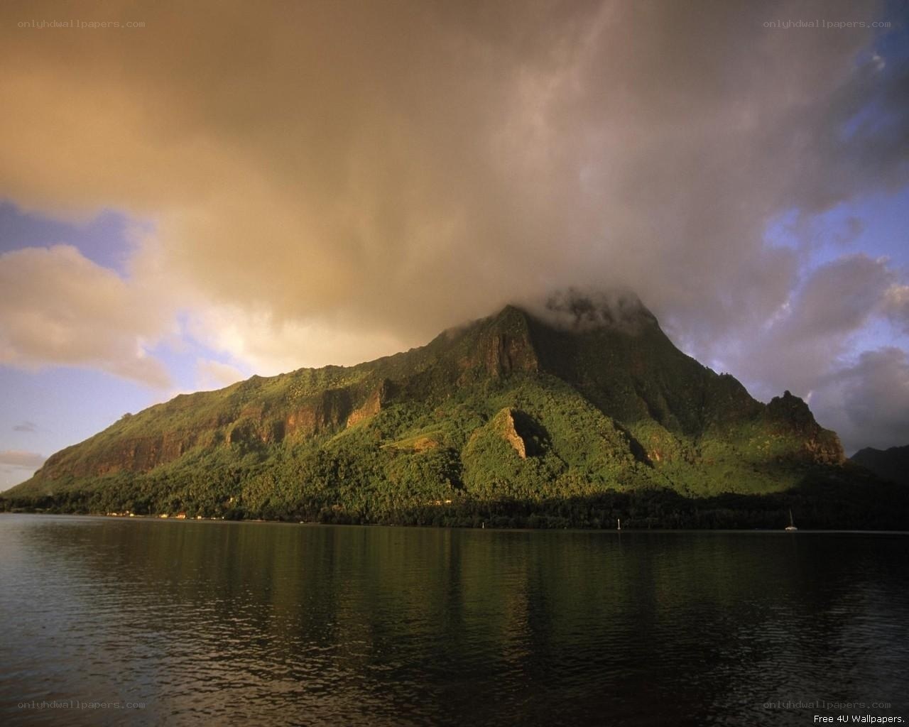 Mountain reflected in calm water