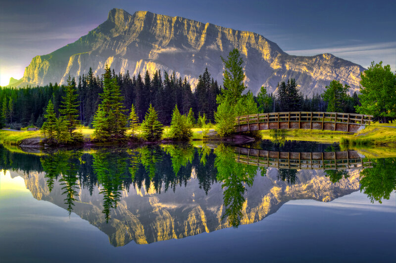 Mountain Reflected in Lake — Blue, Serene, Sunset, Photograph, Forest, Bridge