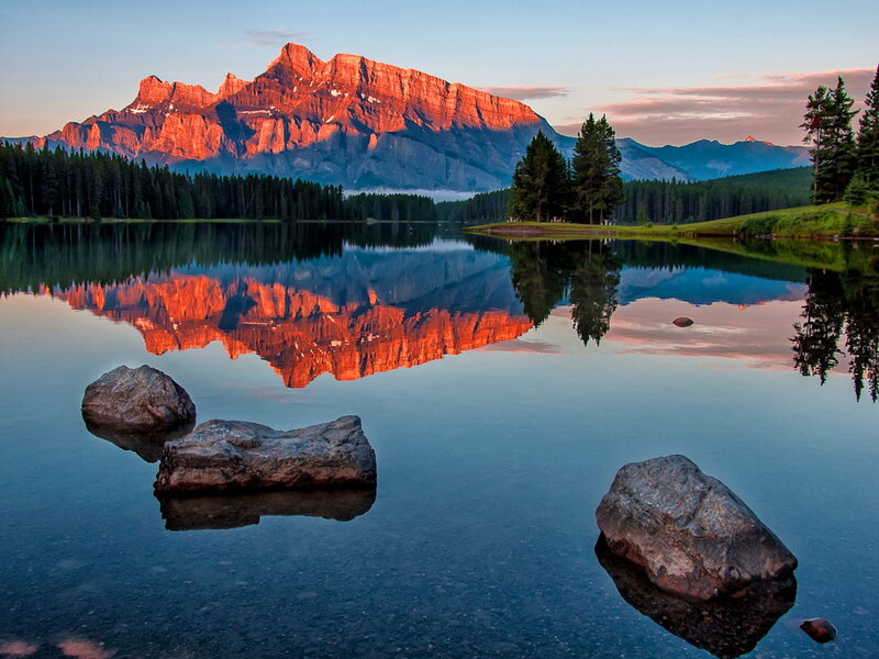 Mountain Reflected in Lake — Blue, Serene, Sunset, Photograph, Trees, Rocks