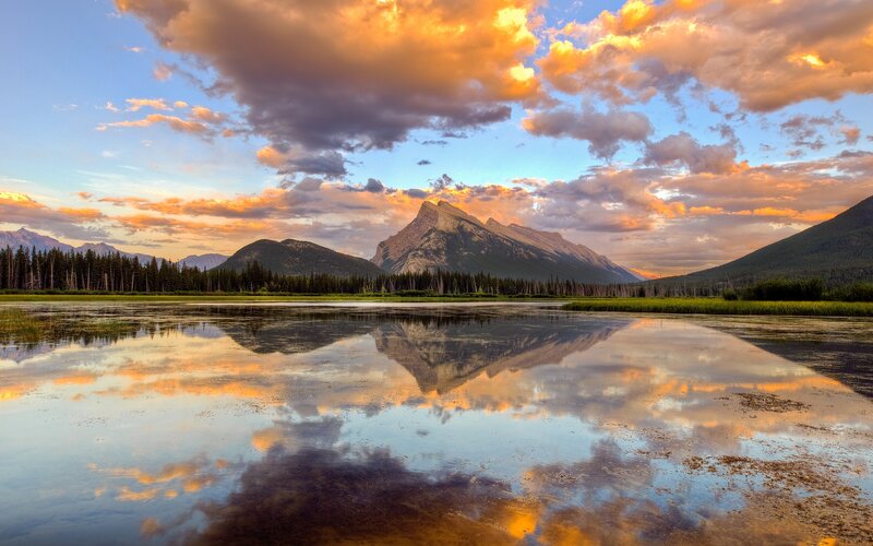 Mountain Reflected in Lake — Orange, Serene, Sunset, Photograph, Clouds, Forest