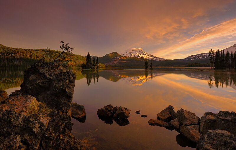 Mountain Reflected in Lake — Orange, Serene, Sunset, Photograph, Forest, Rocks