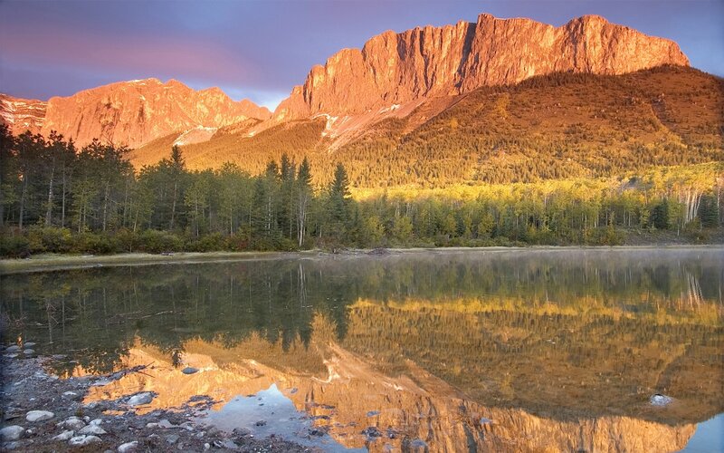 Mountain Reflected in Lake — Orange, Serene, Sunset, Photograph, Forest, Trees