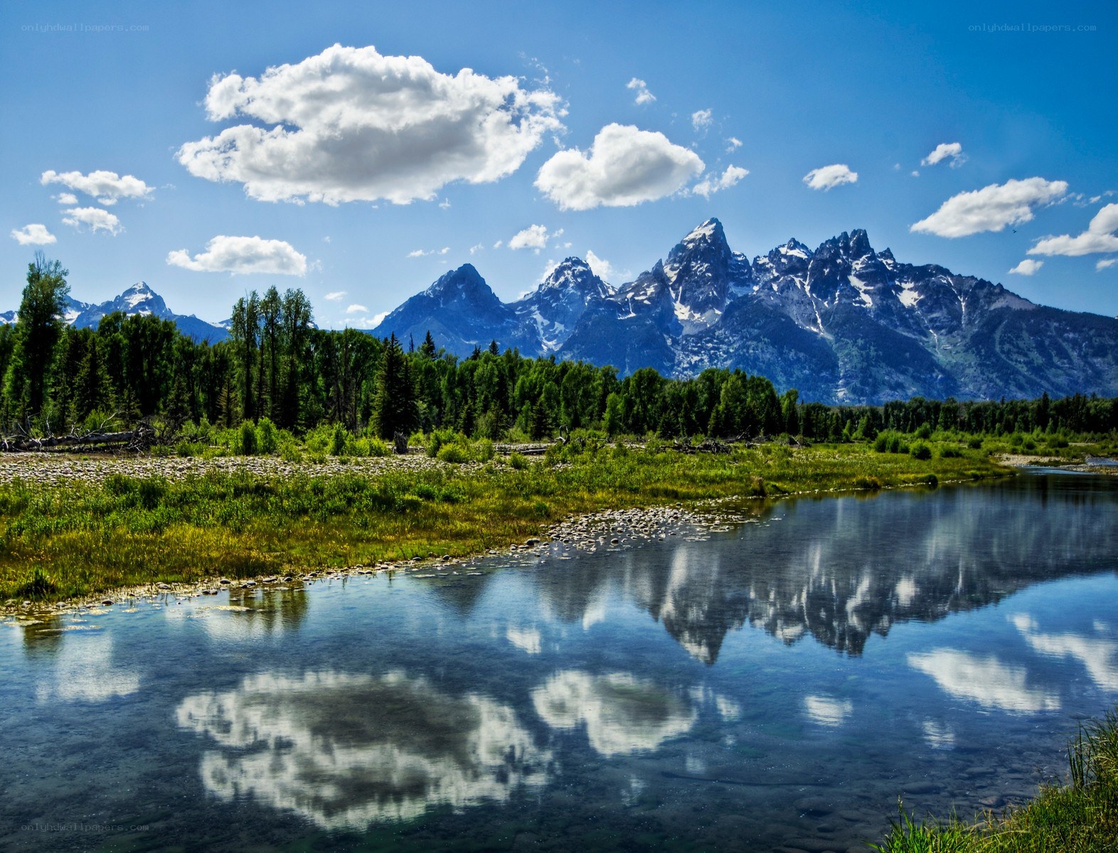 Mountain reflection in a calm river