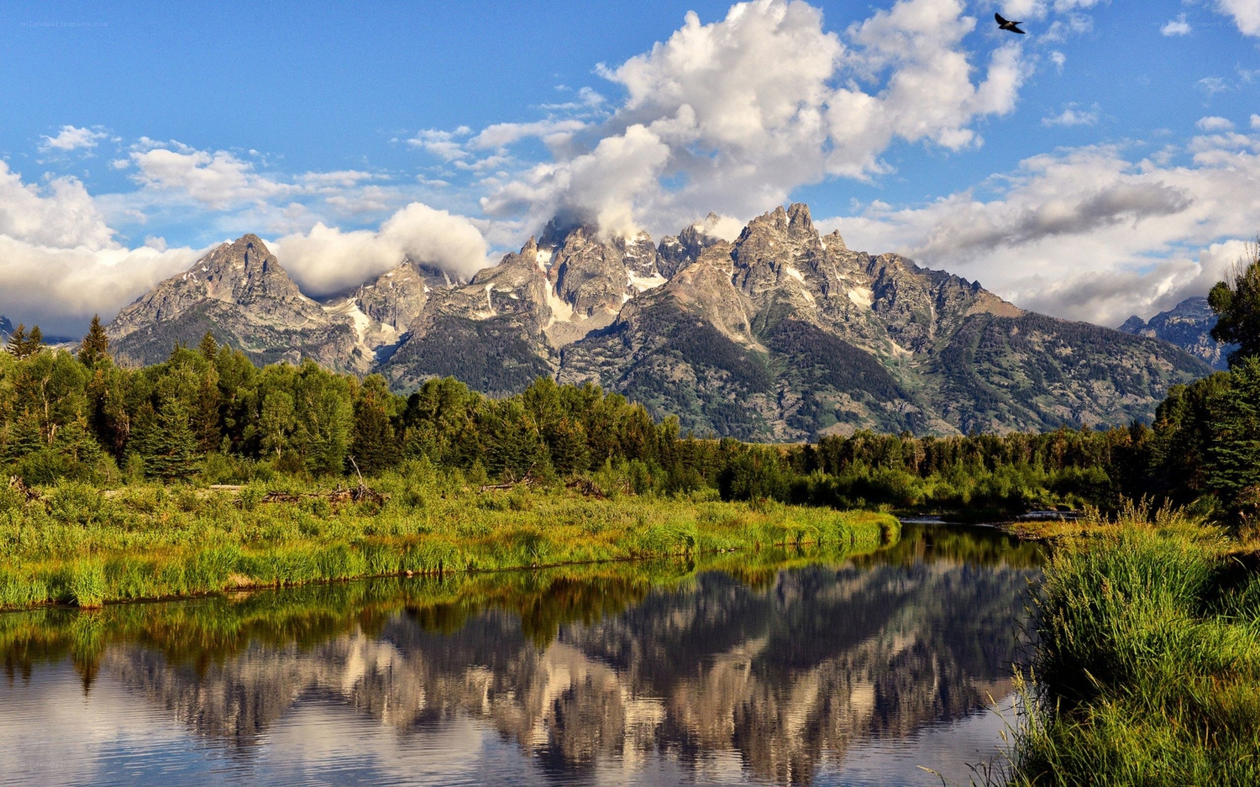 Mountain reflection in a calm river