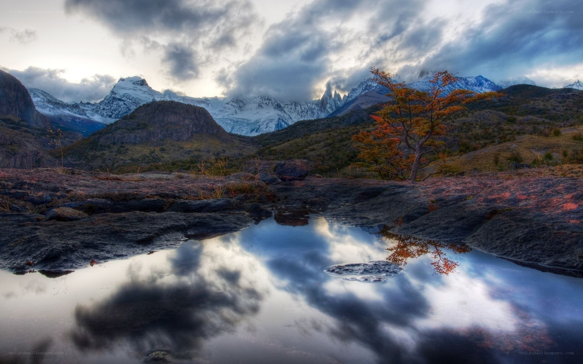 Mountain reflection in a puddle