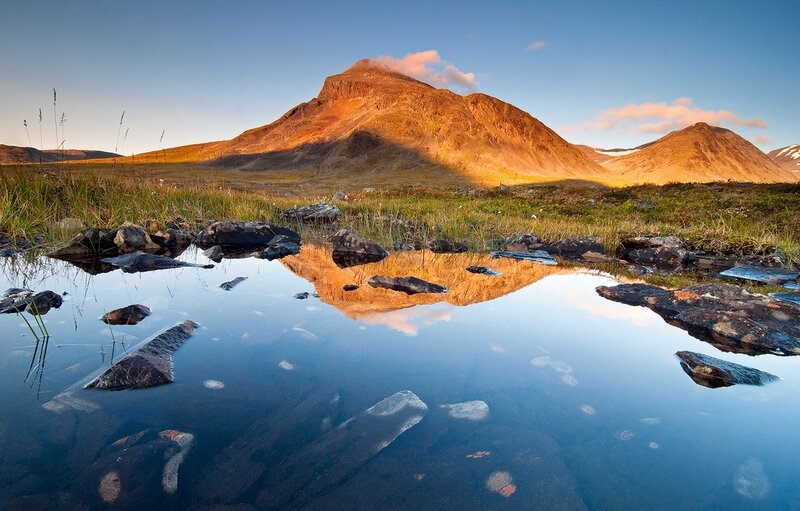 Mountain reflection in a still pool