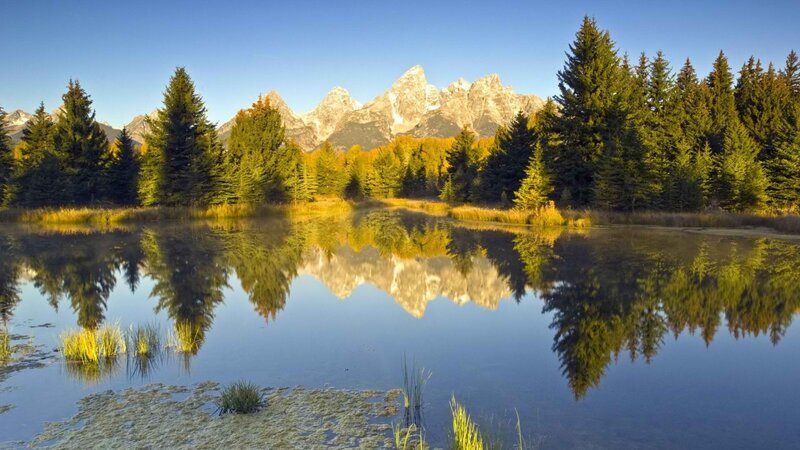 mountain reflection in calm lake