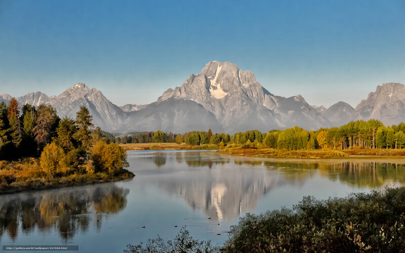 Mountain reflection in calm river