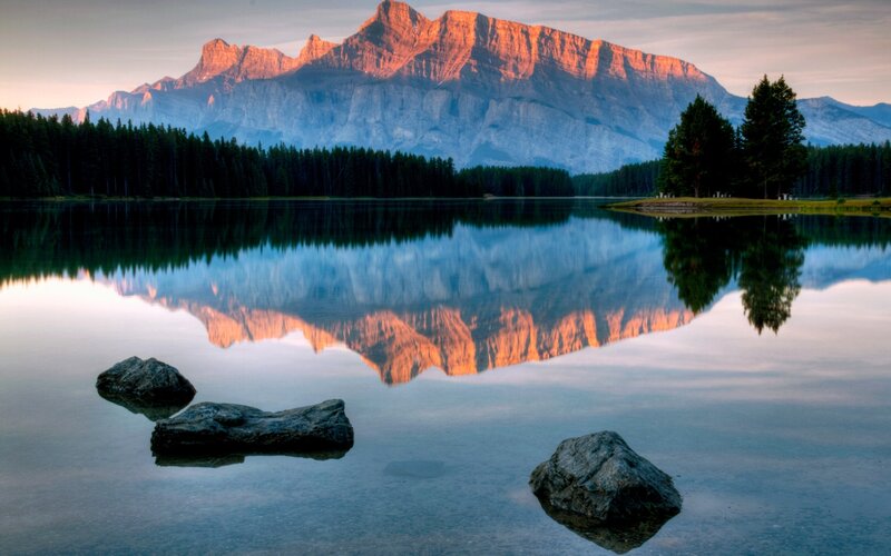 Mountain Reflection in Lake — Blue, Serene, Sunset, Photograph, Trees, Rocks, Forest