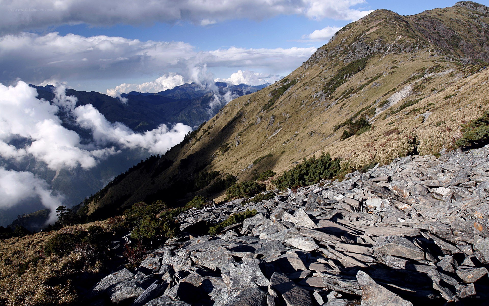 Mountain ridge with clouds