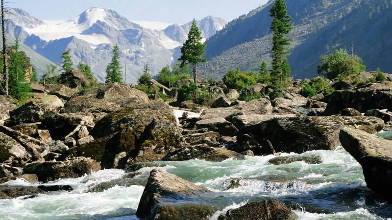 Mountain river flowing through rocks