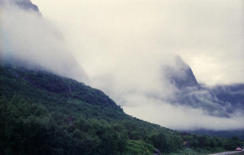 mountain road in foggy weather