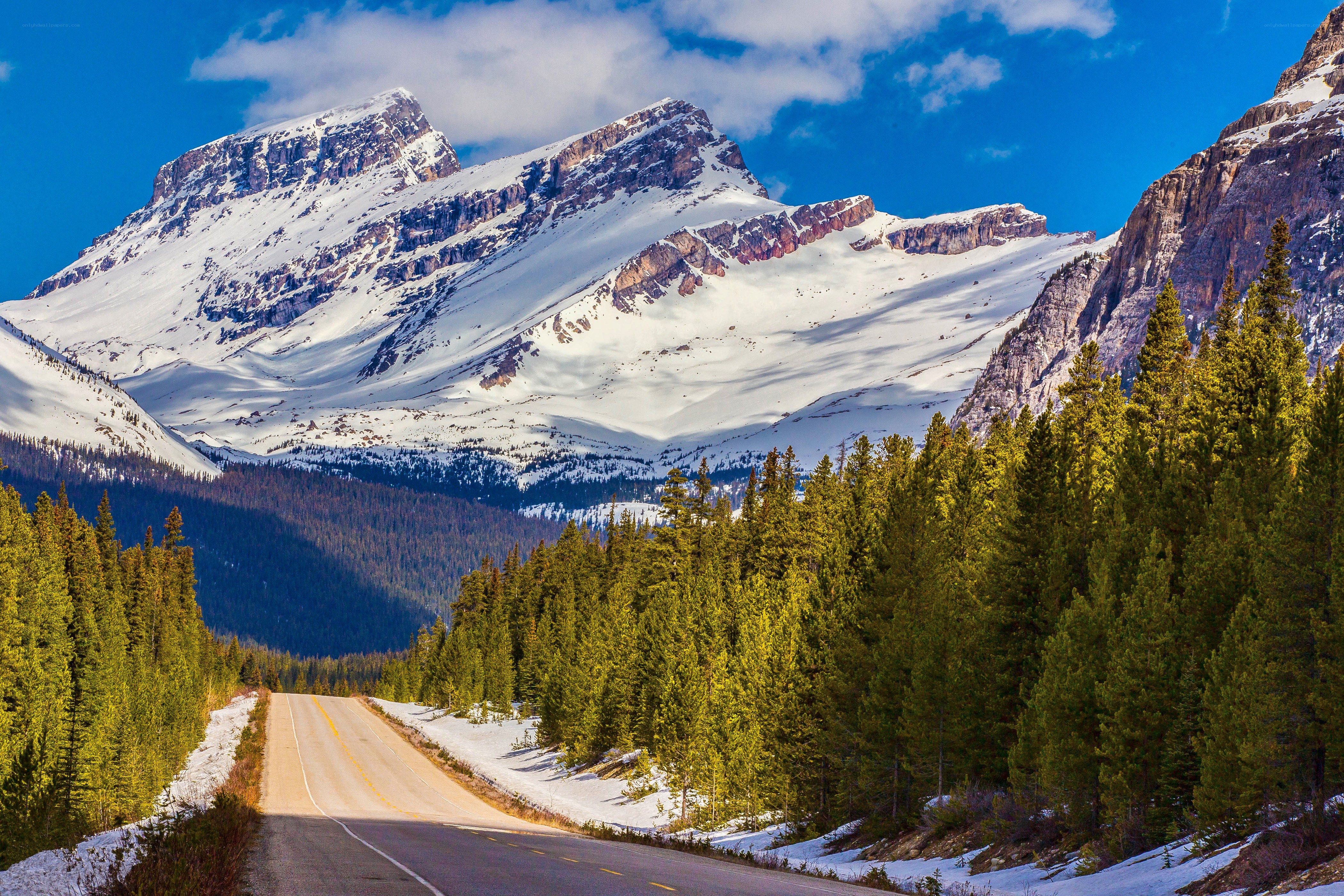 Mountain road in snowy landscape