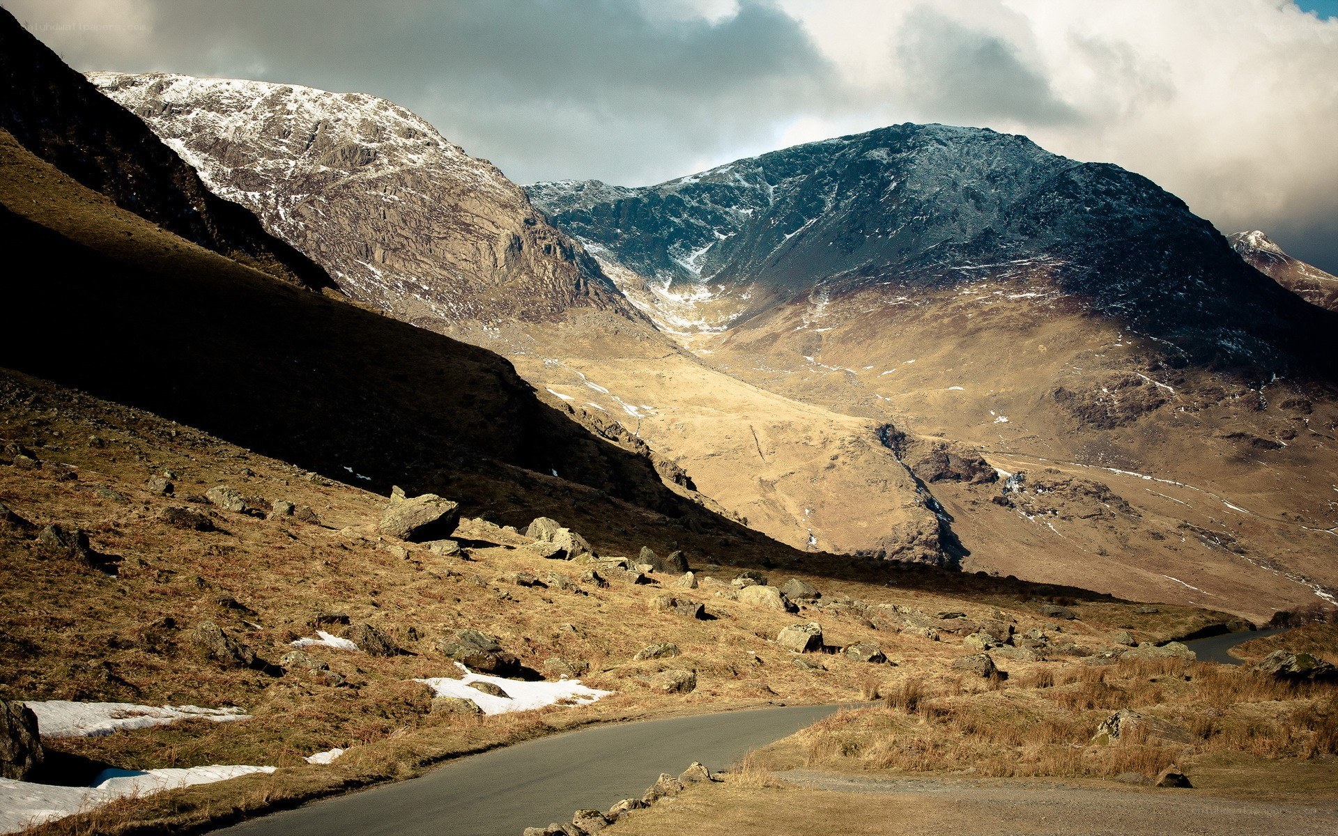 Mountain road in snowy valley