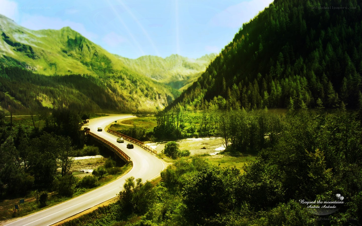 Mountain road through green valley