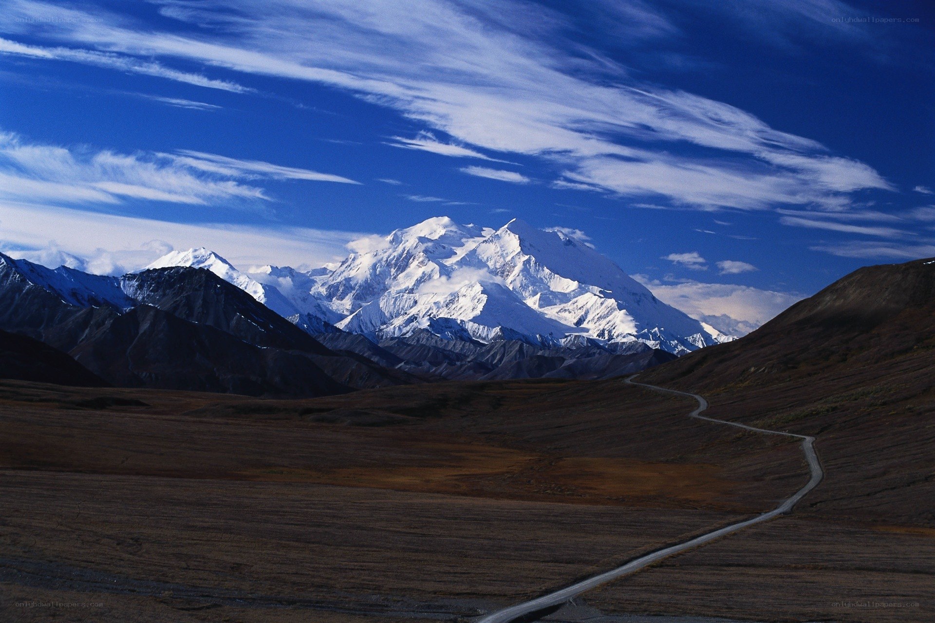 Mountain road under blue sky