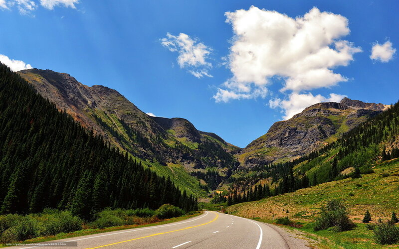 Mountain road under blue sky