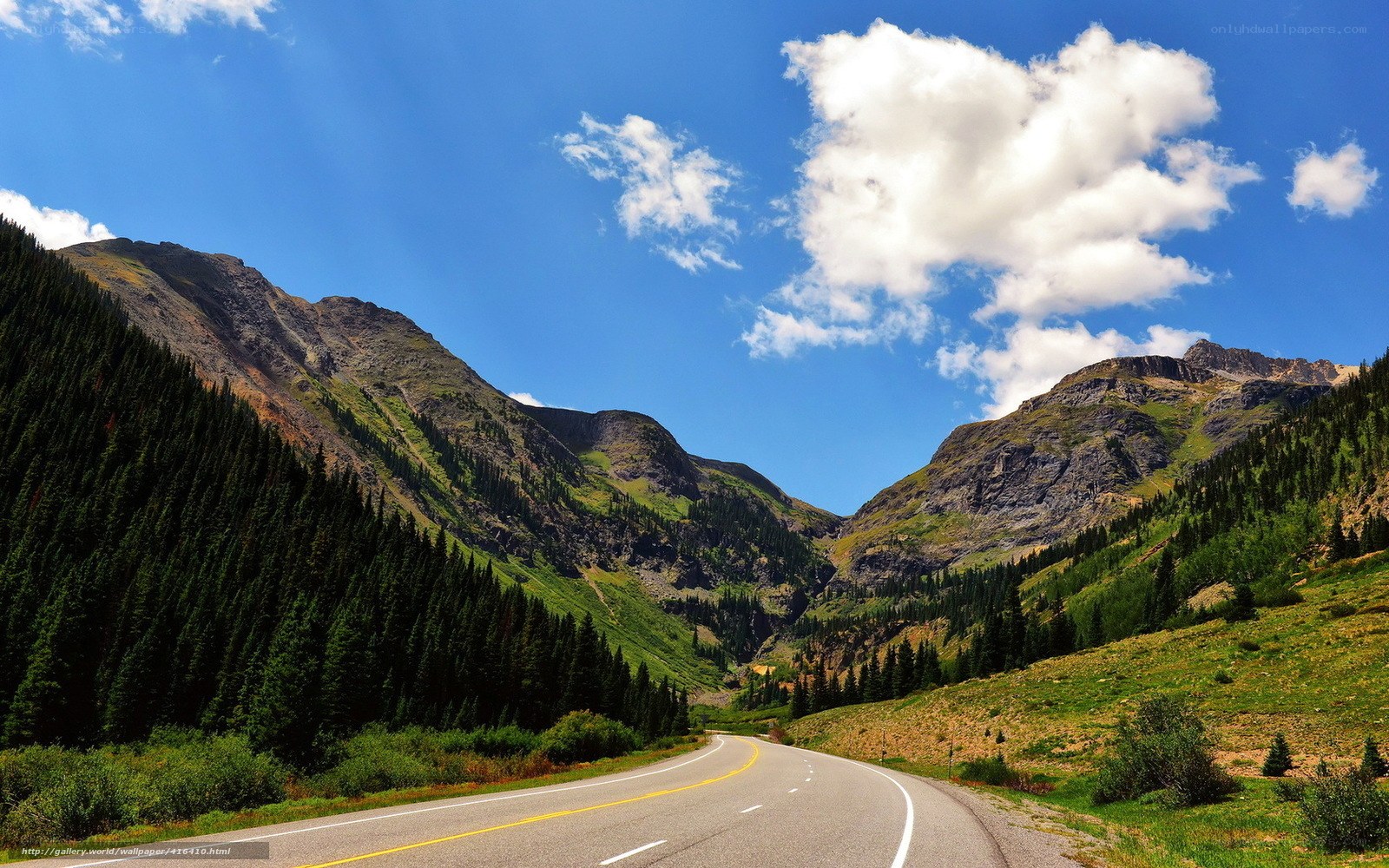 Mountain road under blue sky