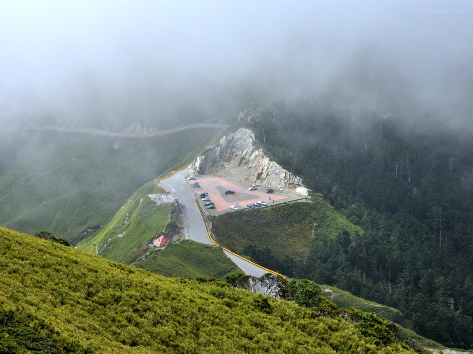 mountain road with parking lot