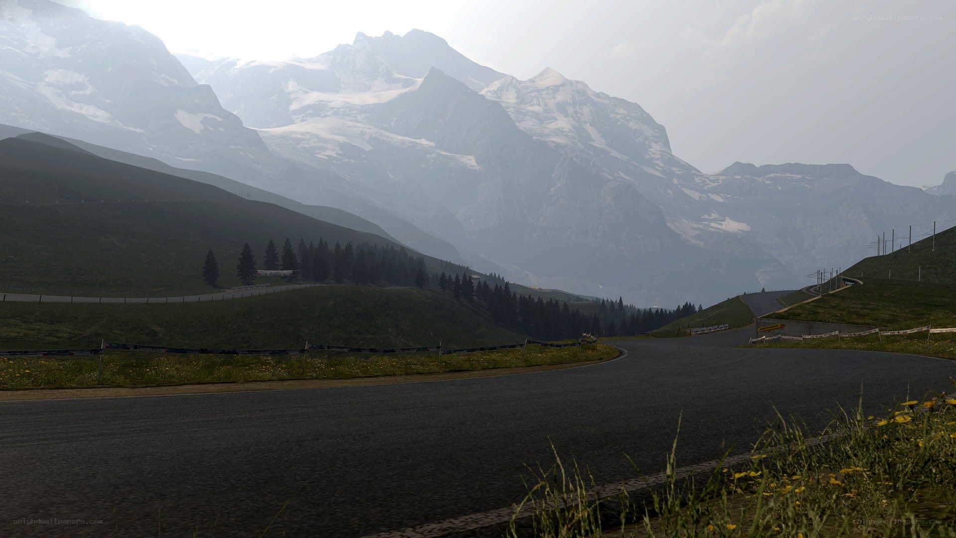 mountain road with snow-capped peaks