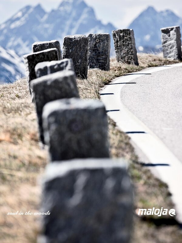 Mountain road with stone posts