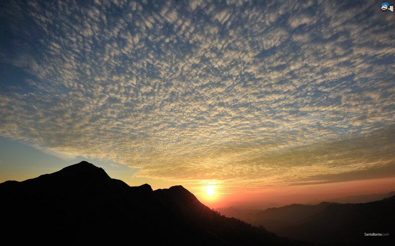 Mountain Silhouette at Sunrise — Orange