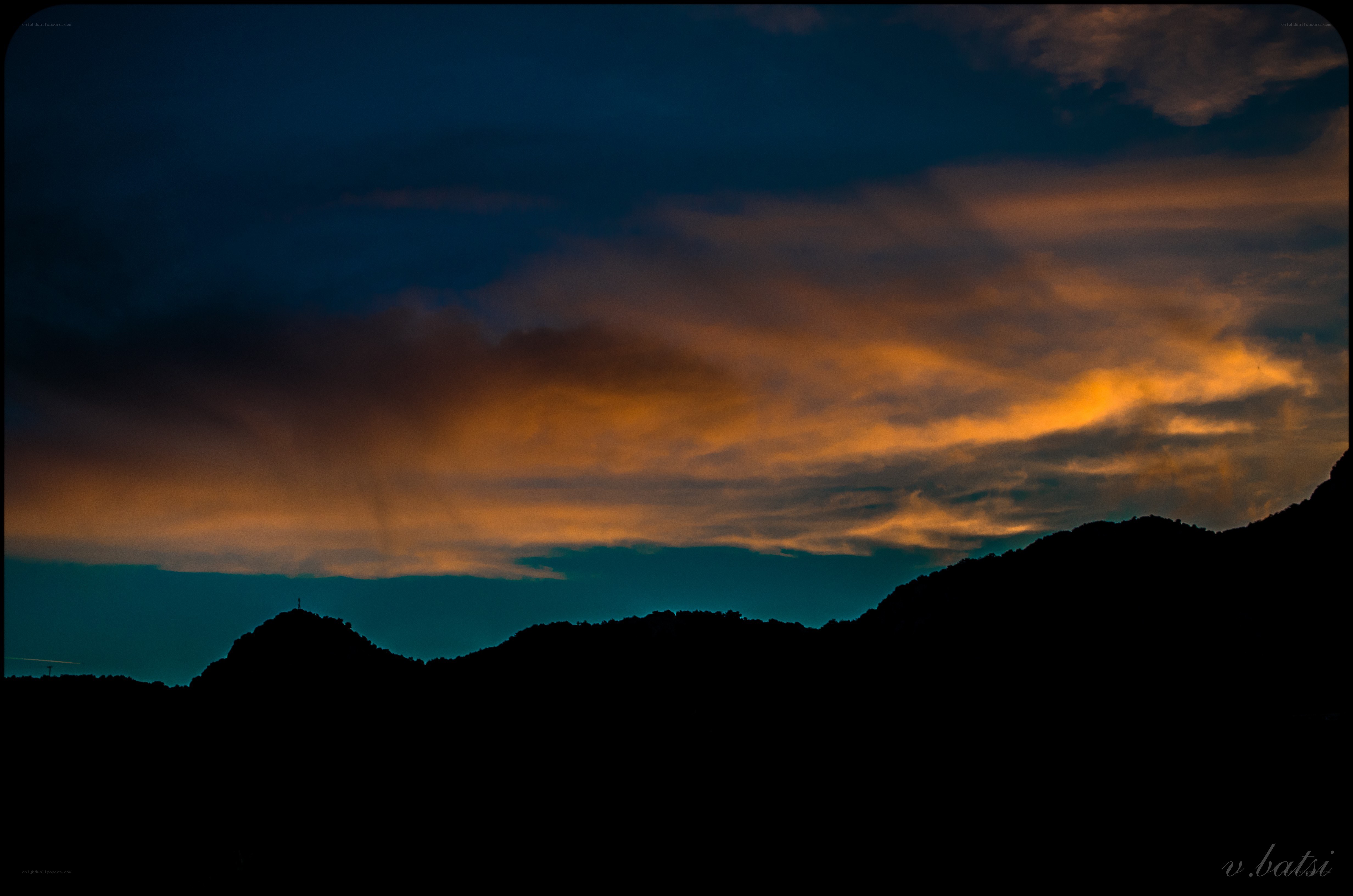Mountain silhouette at sunset