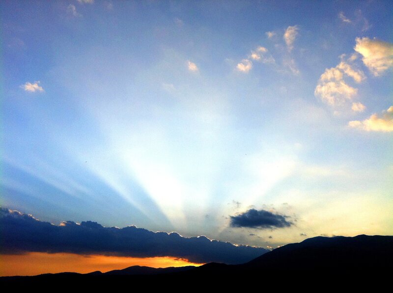 Mountain Silhouette at Sunset — Blue, Dramatic, Photograph, Clouds, Sunbeams