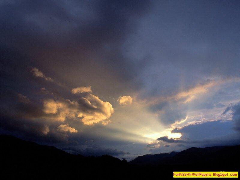 Mountain Silhouette at Sunset — Blue, Dramatic, Photograph, Clouds, Sunlight, Mountains