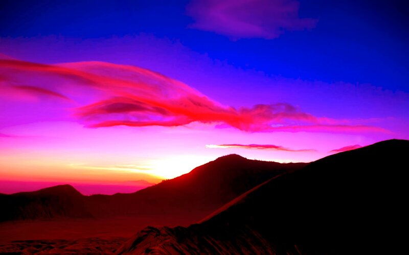 Mountain Silhouette at Sunset — Clouds