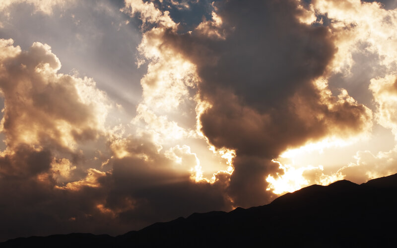 Mountain Silhouette at Sunset — Gold