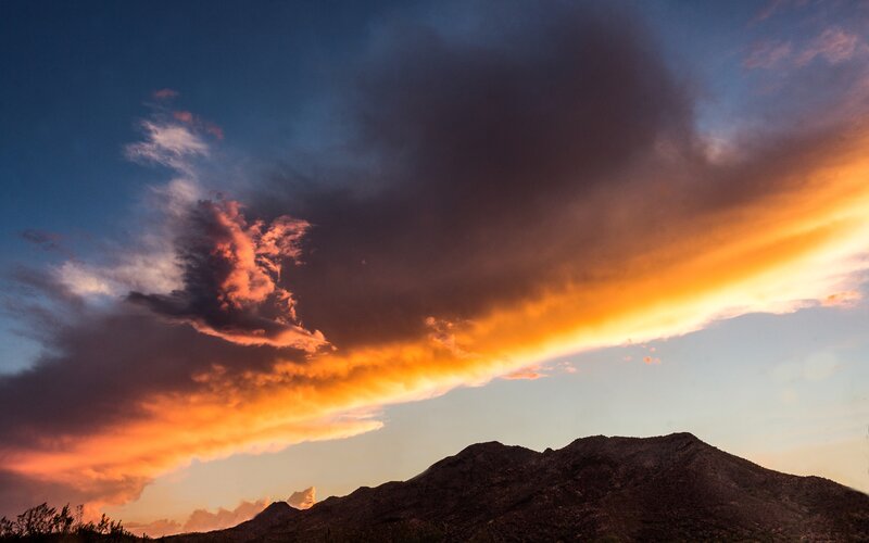 Mountain Silhouette at Sunset — Orange, Dramatic, Photograph, Clouds, Sky, Trees