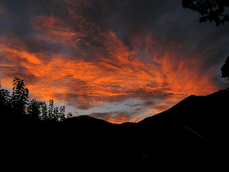 Mountain Silhouette at Sunset — Orange, Dramatic, Photograph, Clouds, Trees
