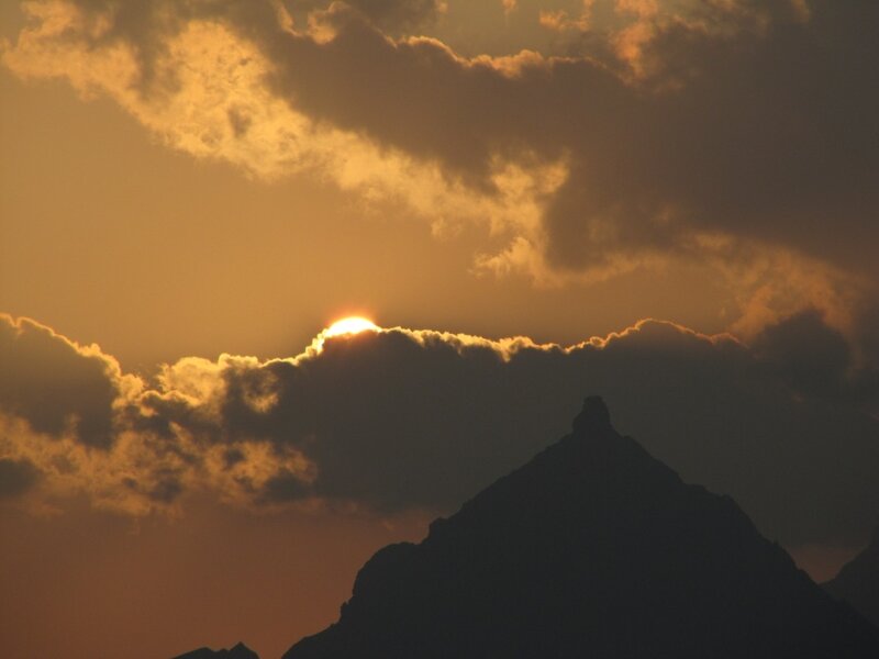 Mountain Silhouette at Sunset — Orange, Dramatic, Photograph, Sun, Clouds, Black