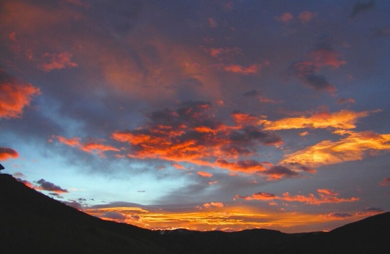 Mountain Silhouette at Sunset — Orange, Dramatic, Photograph
