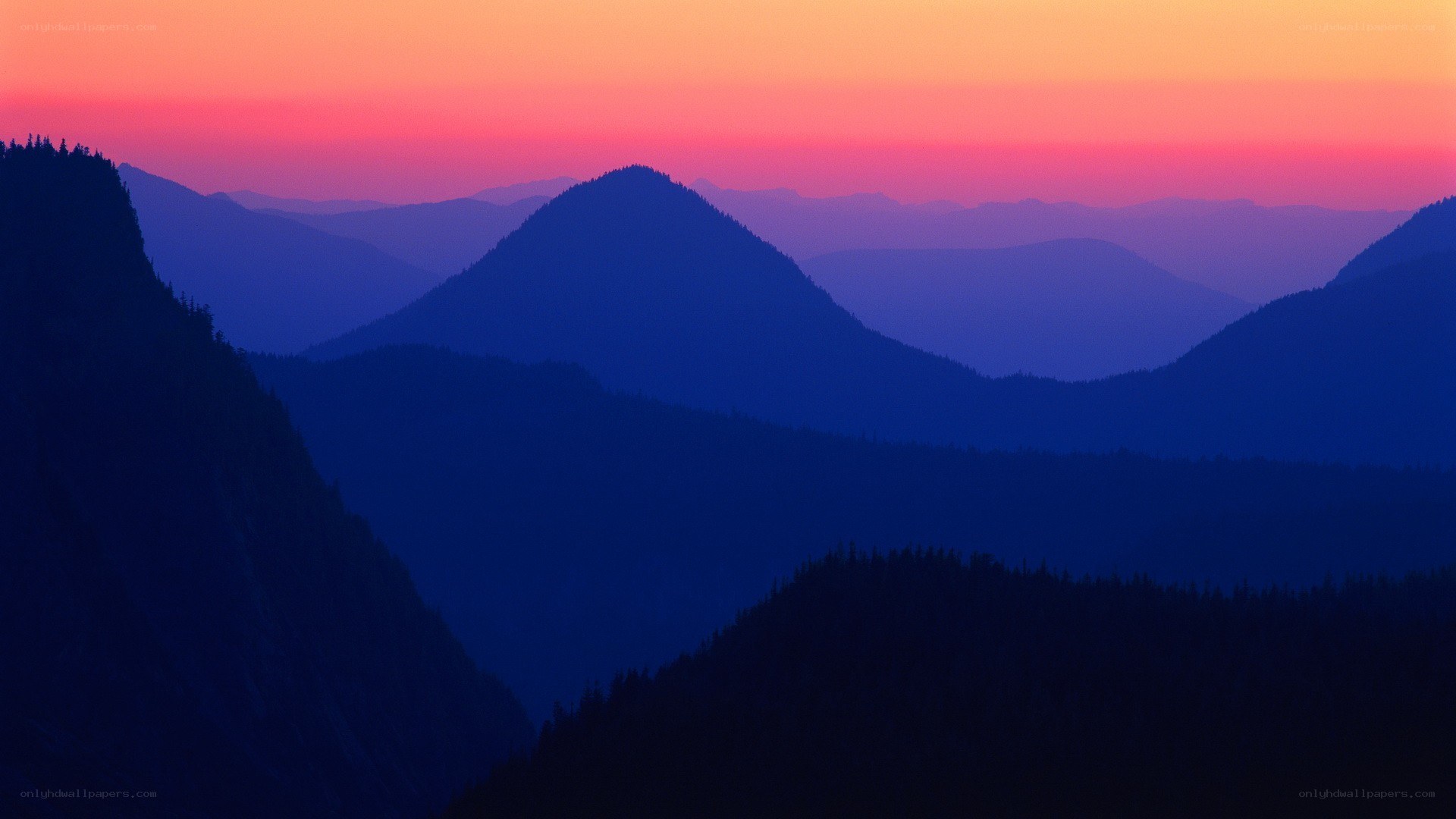 Mountain silhouettes at sunset
